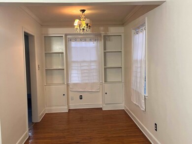 Unfurnished dining area featuring a chandelier, da