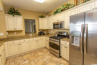 Kitchen featuring appliances with stainless steel 