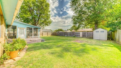 Lovely back yard w mature trees and shed that stay