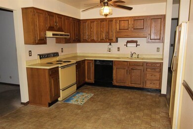 The large eat-in kitchen provides a lot of cabinet