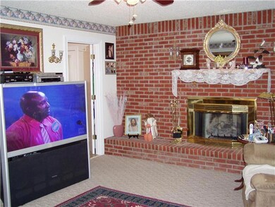 Notice raised hearth.  Door opens into utility room.
