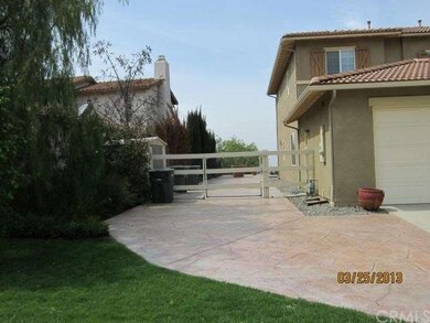 Stamped Colored Concrete Side Driveway & Gated RV 
