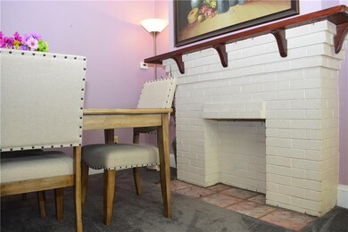 Dinning Room Boasts an Artificial FirePlace