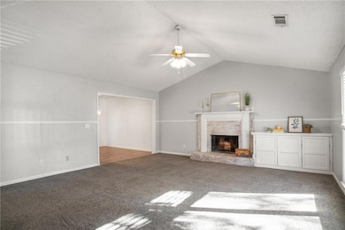 Unfurnished living room with carpet flooring, ceil
