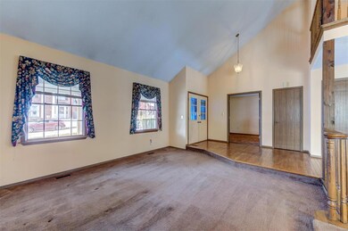 Vaulted foyer greeting you as you enter this spaci