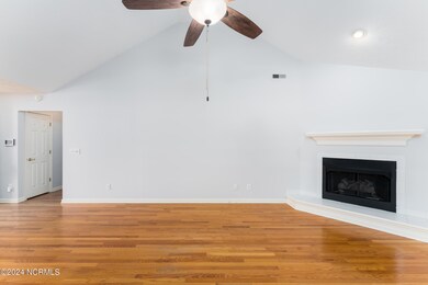 Living Room w/ Vaulted Ceiling