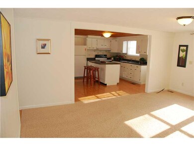 Exterior Front. View from the hall into the great room to the kitchen.