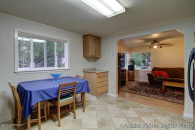 Eat in kitchen with ceramic tile floors