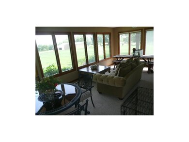 Large Sun Room is just off the kitchen and has a g