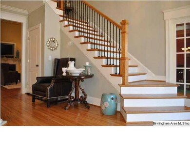 Upon entry you are greeted by hardwood floors, hig