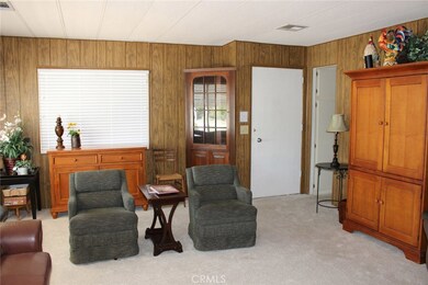 Front entryway door with access to the kitchen on the right.