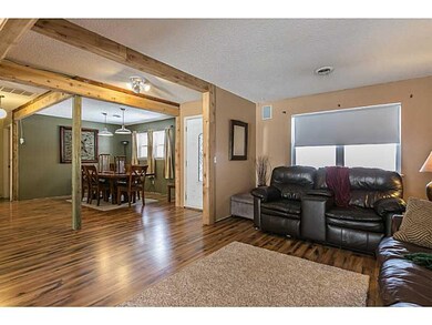 Den/Family/Great Room. notice the beams on the din