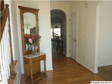 Large Foyer with Hardwood floors