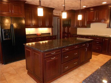 GOURMET MANORHOUSE CHERRY  KITCHEN W/GRANITE CONTE