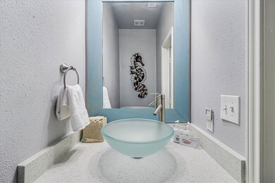 Half bath downstairs, convenient to pool area and
