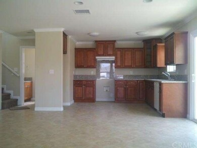 Downstairs kitchen with beautiful tile floors and 