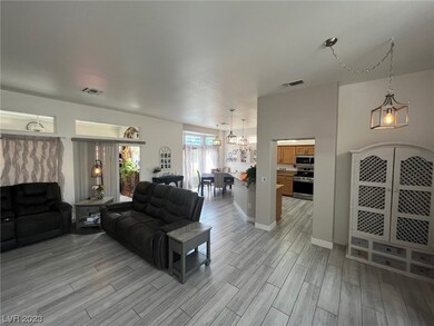 Living Room opens to kitchen and dining area