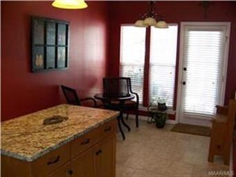 Center island in kitchen looking into eat in area 