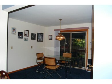 Kitchen dinette area with siding doors to an aweso