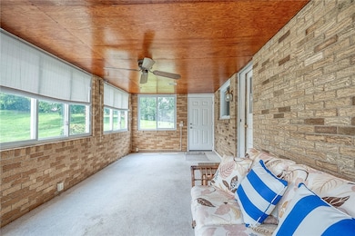 Spacious 3 season room, just off the kitchen. Plen