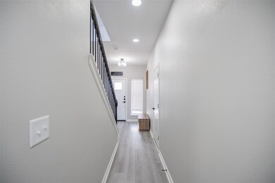 Hallway looking at front door.