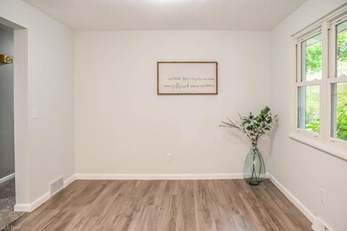 Roomy dinette open to the kitchen.