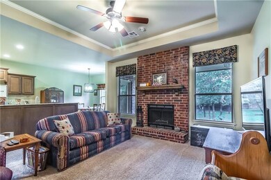 Spacious living room with windows overlooking the 