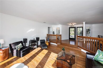Open to foyer and dining