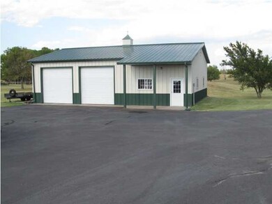 The Morton building to house two more vehicles.