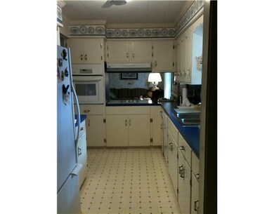 Kitchen. Kitchen is open to living room and dining