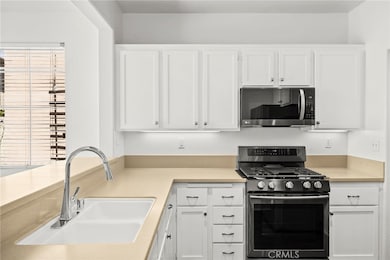Kitchen freshly painted and newer appliances