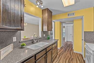 Spacious Kitchen with Corian counters and refinish