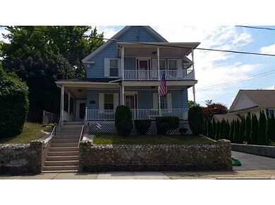 Exterior Front. Frontal view showing new porches