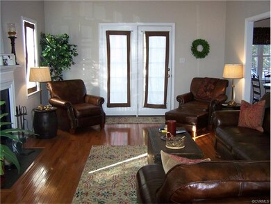 Family room with new hardwood flooring, gas firepl