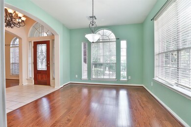 This home welcomes you with a spacious foyer that leads to both a formal dining room and a formal living room. This area could also be used as a home office or a play area.