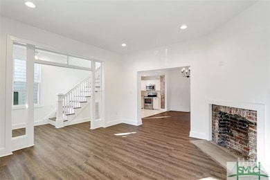 Open Floor Plan - undecorated or painted - Living room to Entry and Open Dining