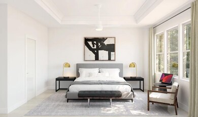 Primary suite with tray ceiling with crown moulding