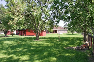 fenced acreage with propane tank