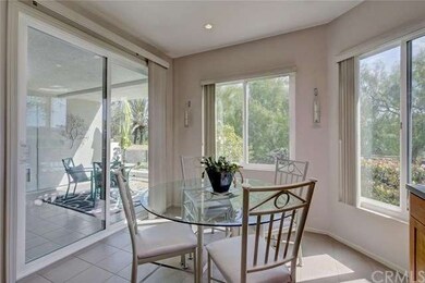 Light-filled dining room opening to the living roo