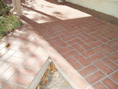 Brick sidewalk to front door