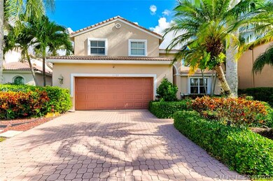 Welcome to this beautifully landscaped and sunny F