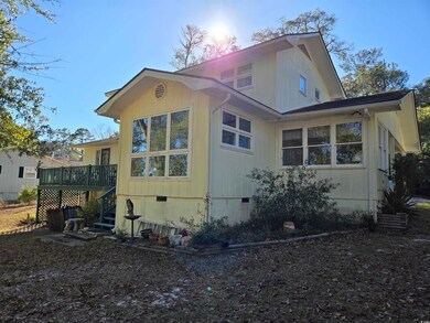 View of property exterior with crawl space and a w