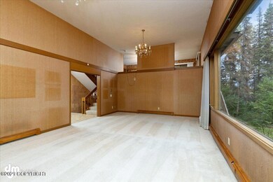Living room open to formal dining area