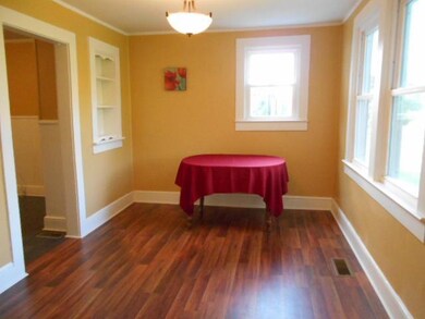 Dining room adjoins the living room and has two custom built-ins!