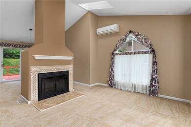 Living Room with Freestanding Fireplace