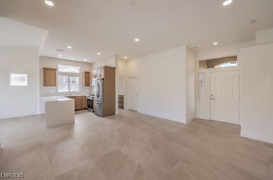 Kitchen with stainless steel appliances, open floo