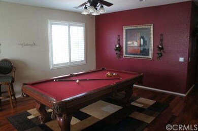 Plantation shutters in the game room, master bedro
