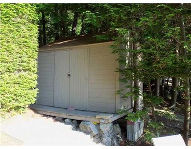 Exterior Front. Boat shed for lake...