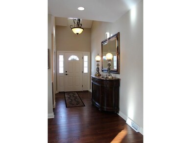 Entry/Foyer. A built-in accent shelf with granite 