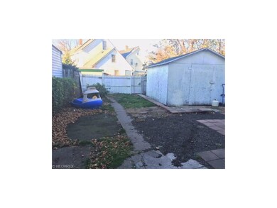Back yard with alley access for potential parking